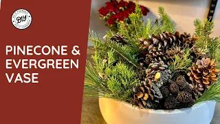 create your own stunning holiday vase with pinecones and evergreens