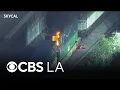 Los Angeles police say fires inside Amazon cargo containers on trains are connected to theft