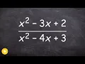 How to simplify a rational expression and write the excluded values