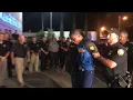 Teen accused of killing Biloxi officer escorted into police station