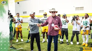 Surprise Packers Head Coach Matt LaFleur congratulates Larry McCarren on training camp No 50