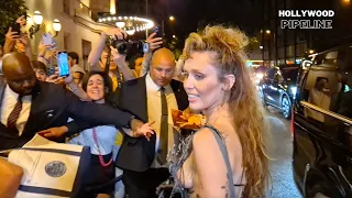 Miley Cyrus Draws a Crowd in Risque Gown in Paris