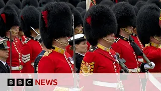 troops perform royal salute in buckingham palace garden following king charles coronation bbc news