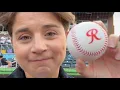 Arielle Orsuto throws out the first pitch at a Tacoma Rainiers game