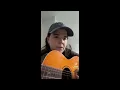Leith Ross playing on the guitar