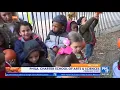 String Theory Schools - Students collect pumpkins from school s pumpkin patch
