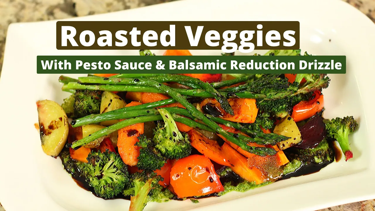 Roasted Vegetables Over Pesto Sauce With A Balsamic Reduction Drizzle