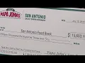 Papa John s Pizza presents 15 000 check to San Antonio Food Bank