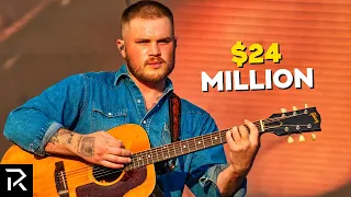 Zach Bryan s Net Worth Went From Navy Boots To Platinum Loot