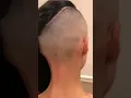 Girl long undercut shaved sides