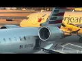 American Airlines 1857 pushes back from gate B10 to head to Charlotte w a de-icing truck moving