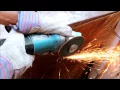Makita Angle Grinder in Action Cutting Stainless Steel Rod
