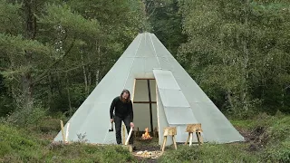 Bushcraft basecamp trip - rain, canvas lavvu, making sawhorse, roasting chicken, sharpening etc