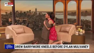 Drew Barrymore s cringe worthy kneel with Dylan Mulvaney