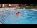 Swimming without life jacket for the first time . Ashley