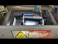 Laser engraving a tumbler with a K40 OMTECH and FTG Rotary