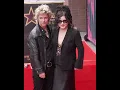 Download Lagu Billie Joe Armstrong and Adrienne Armstrong pose with Green Day's star on the Hollywood Walk of Fame