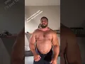 Thick and beefy shirtless muscle bear dancing for our entertainment