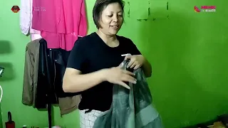 di ruang depan bunda minum obat pereda sakit setelah itu ngambil sisa uang belanja dan menghitungnya