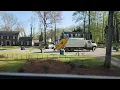 Dekalb SANITATION Crew mixes Recycle with leaves sticks