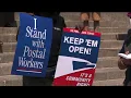 NY AG sues USPS on day of action