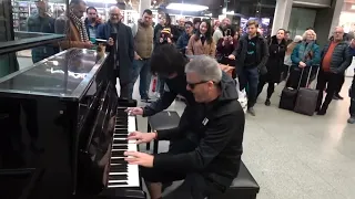 epic piano battle brings crowd to a standstill