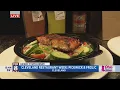 Kenny checks out the menu for Downtown Cleveland Restaurant Week