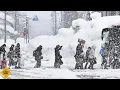 Download Lagu China: Sneeuwstorm legt duizenden mensen vast in Tibet! Tyfoon Matmo verwoest Guangdong