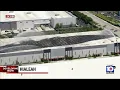 Firefighters rush to extinguish flames at Hialeah warehouse