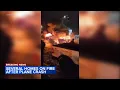 Burning cars debris litter street after Philadelphia plane crash at Roosevelt Mall