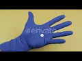 One Round White Pill in Hand Dressed in Rubber Sterile Medical Glove Stock Footage - Envato el