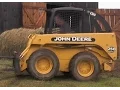 Fast John Deere 250 Skid Steer at Work moving Hay