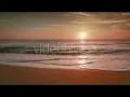 Sandy Beach With Fresh Sea Foam in Sunset Light