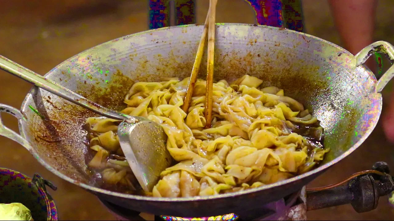 Street Food in Thailand. Thai Street Food & Shopping at a Market in Krabi Thailand. Thai Food Tour