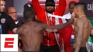 Terence Crawford throws punch at Jose Benavidez Jr during weigh-in ESPN