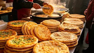 【LIVE】Various large flatbreads for sale at a roadside stall in the morning market.