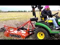 Christy Manhandles The Rhino Deere 1025R with 4 Rotary Mower