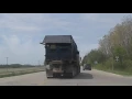 Truck throwing stones at my car windshield
