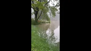 Floodwaters nearly cover cars in Muncie after record-breaking rain fall
