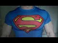 Superman flexing in the bathroom