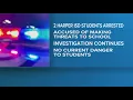 Two Harper High School students are accused of making violent threats against the school