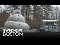 Lagu Family builds massive snowman at Massachusetts home