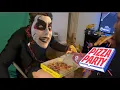 Pantless Danhausen eats Hungry Howies pizza