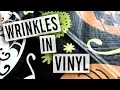 How to Get Wrinkles out of Vinyl Tablecloths and Shower Curtains