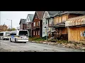 DDOT RTS NOVA DDOT LOW FLOOR DRIVING BY DETROIT LIQUOR STORE OLD BORDED UP HOUSES