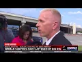 Woman survives after big rig lands on her car
