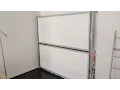 Demonstration of 2 single bunk beds that fold up into the wall