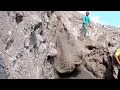 Download Lagu Digging through the sand in a narrow cliff passage..