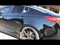 Kia Optima lowered on Megan Coilovers 32 adjustable and 19 rims after a one step polish