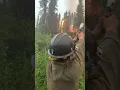 Firefighter uses flare gun to ignite fuels in a successful defensive burning operation.